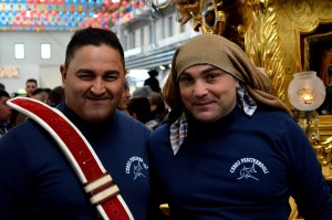 Carriers of the fishmongers candelora in 2014 during the Saint Agatha festival in Catania.